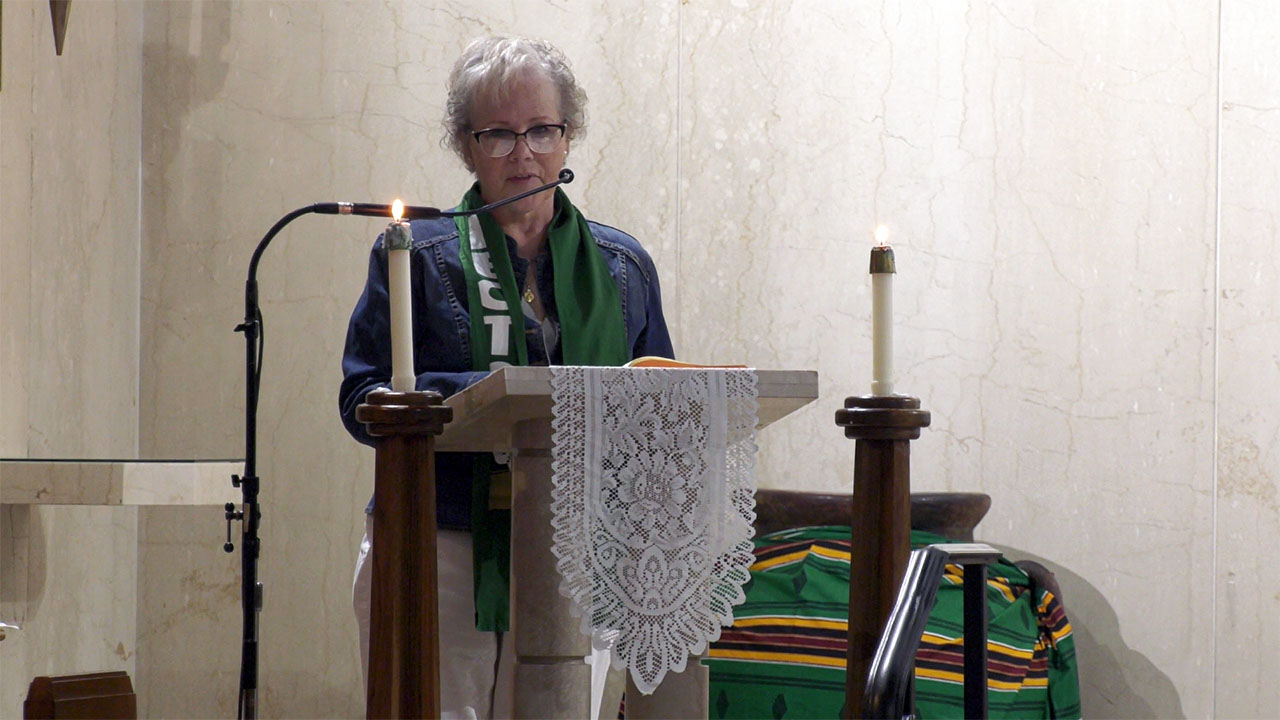 A St. Therese Little Flower Parish Lector delivering a reading at Sunday Mass.