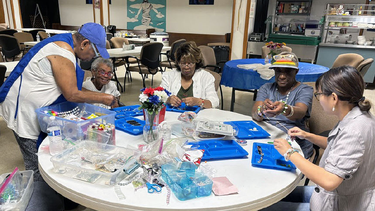 Jewelry making activity at the St. Therese Little Flower Parish Senior Center