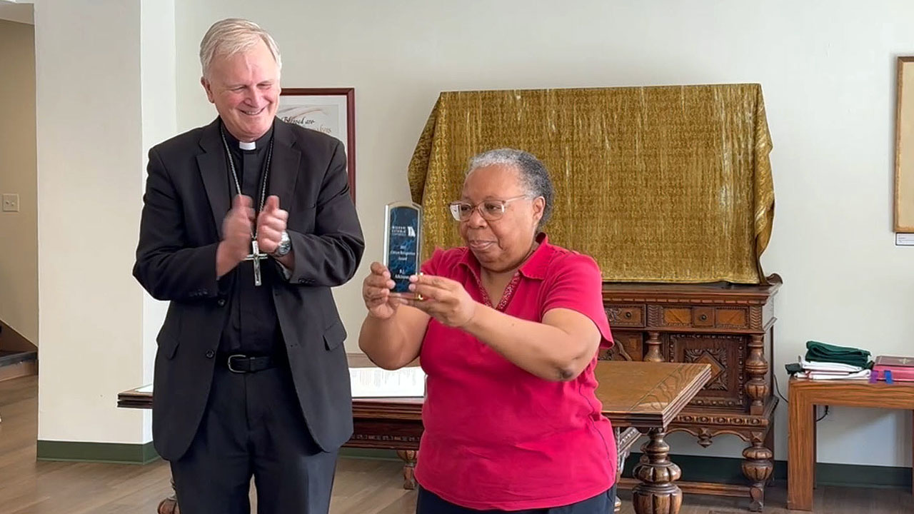 Bishop Johnston Presents parishioner B.J. Atkinson with the 2025 Missouri Catholic Conference Citizen Recognition Award. 