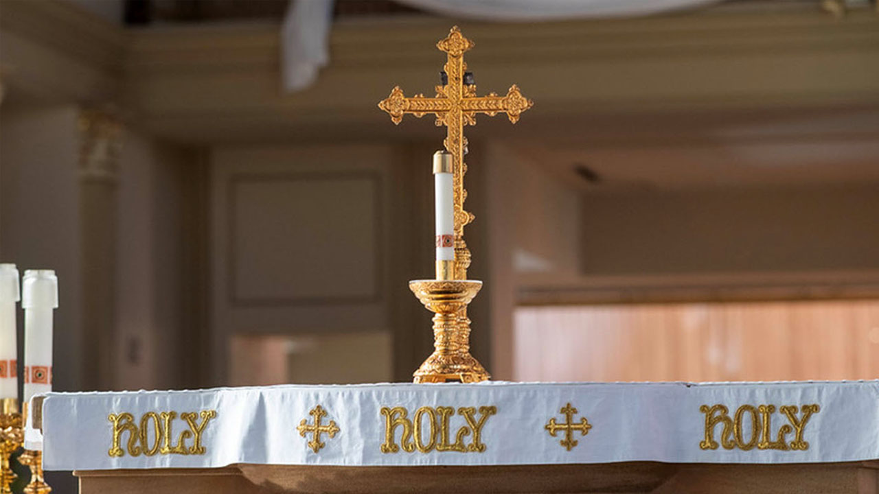 A holy cross displayed on the sacred altar